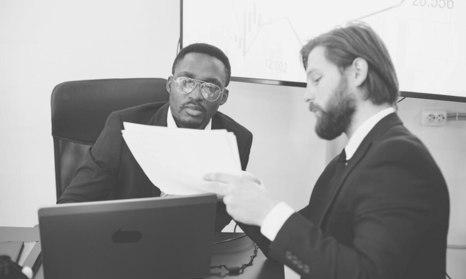 Business professionals collaborating on financial strategy